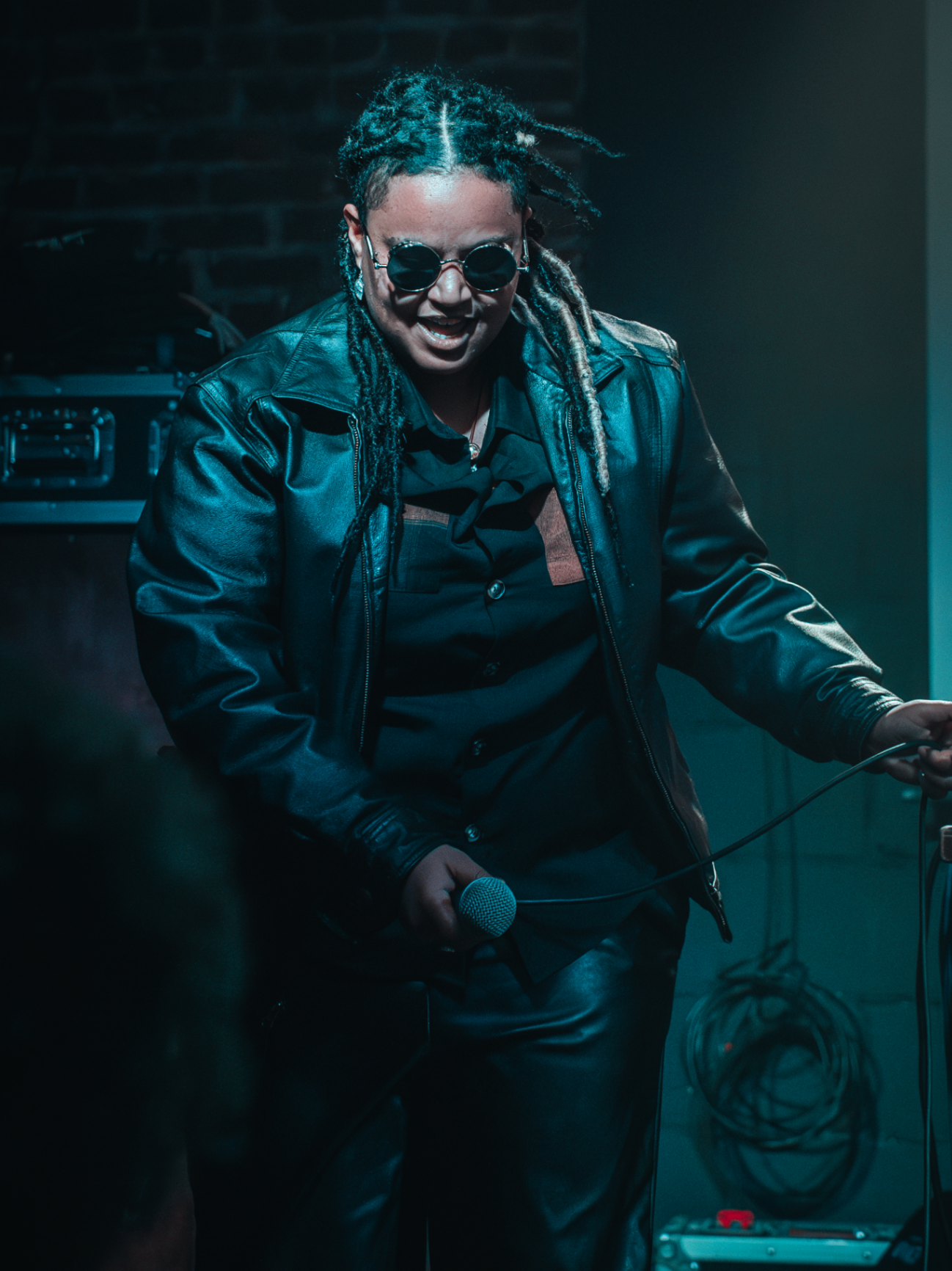Michy Mata performing on stage